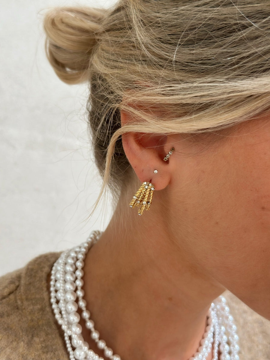 Les boucles d’oreille Nevine-Gualap